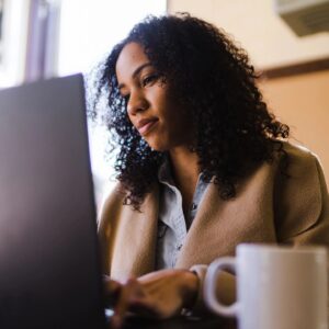 working mom at a computer